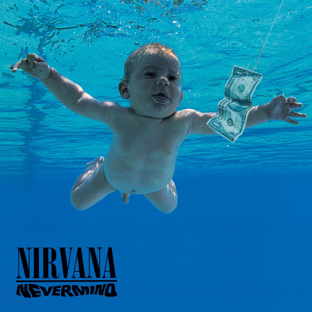 Capa do álbum Nevermind, do Nirvana, em que um bebê aparece nadando atrás de uma nota de dólar